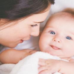 When does a child begin to see and recognize his mother?
