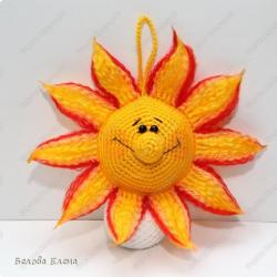 Crocheted amigurumi sun Crochet crocheted sun with patterns and description